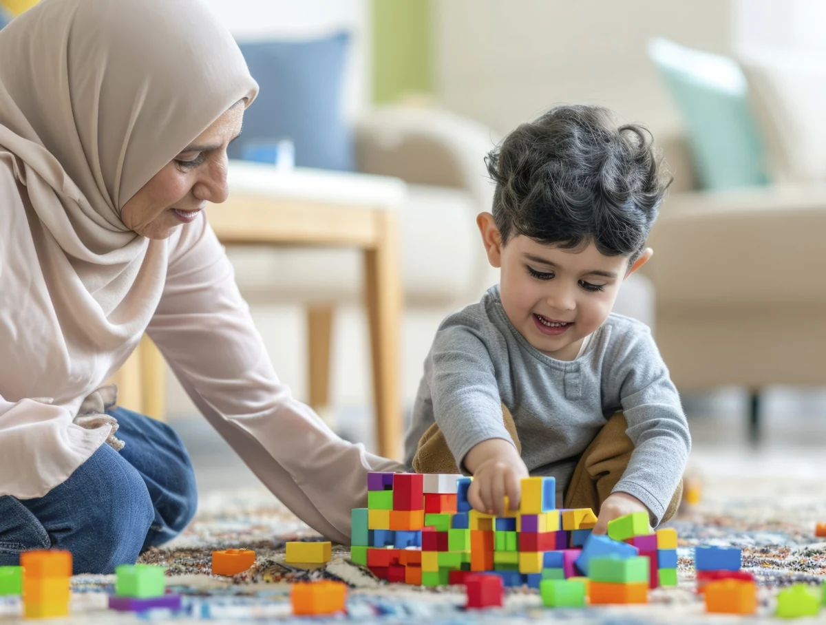 Child building with blocks alongside an adult